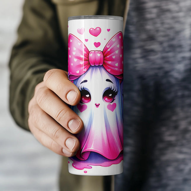 a person holding a cup with a picture of a unicorn on it
