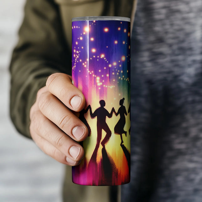 a person holding a coffee mug with a painting on it