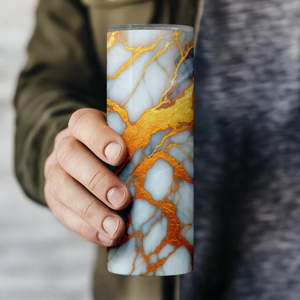 a person holding a cup with a marble pattern on it