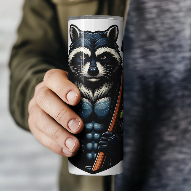 a person holding a coffee cup with a raccoon on it