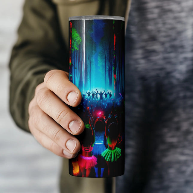 a person holding a coffee cup with a painting on it