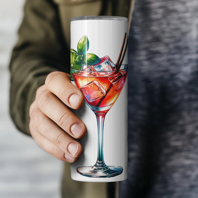 a person holding a cup with a drink in it