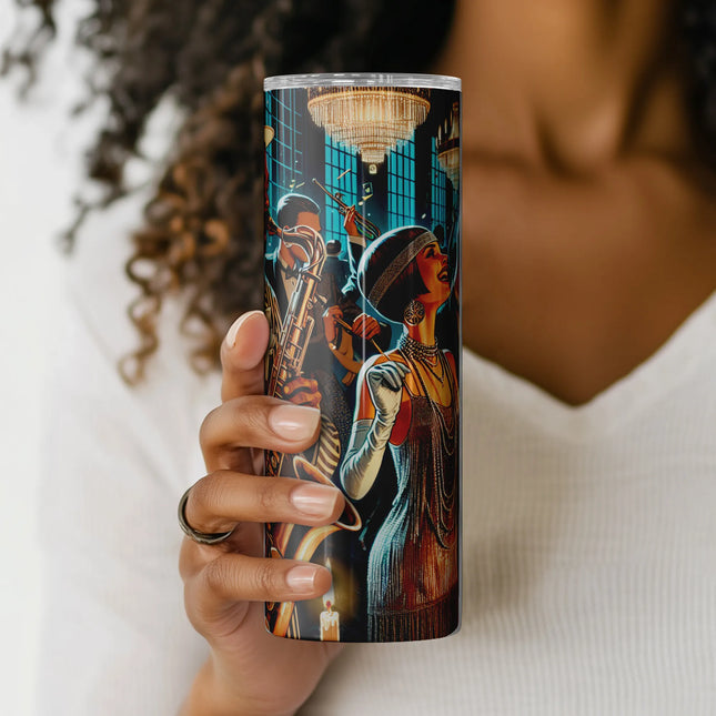 a woman holding a cup with a painting on it