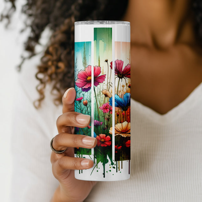 a woman holding a can with a painting of flowers on it