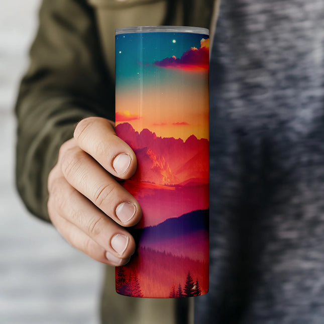 a person holding a cup with a painting on it
