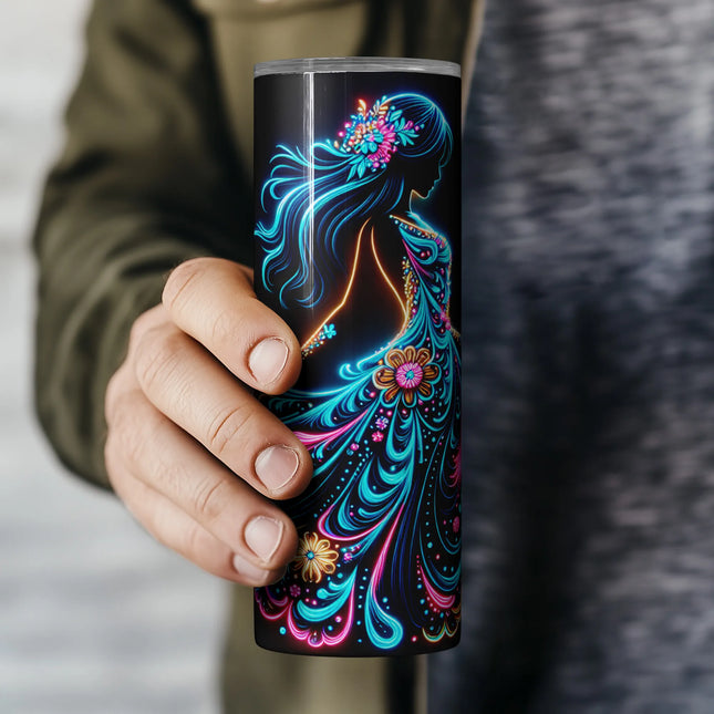 a person holding a colorful coffee cup in their hand