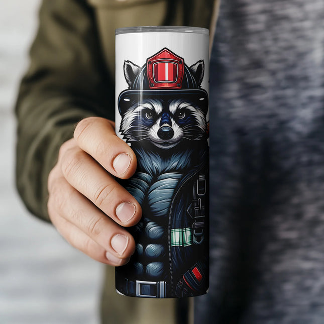 Firefighter-themed raccoon PNG for 20oz tumblers and custom rescue merch.