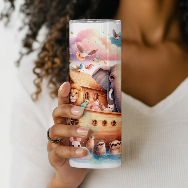 Close-up of animal pairs including elephants, lions, and giraffes in the Noah’s Ark sublimation wrap design.