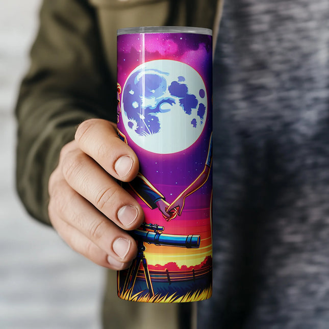 Dreamy couple holding hands with telescope and moon backdrop – skinny tumbler wrap PNG.