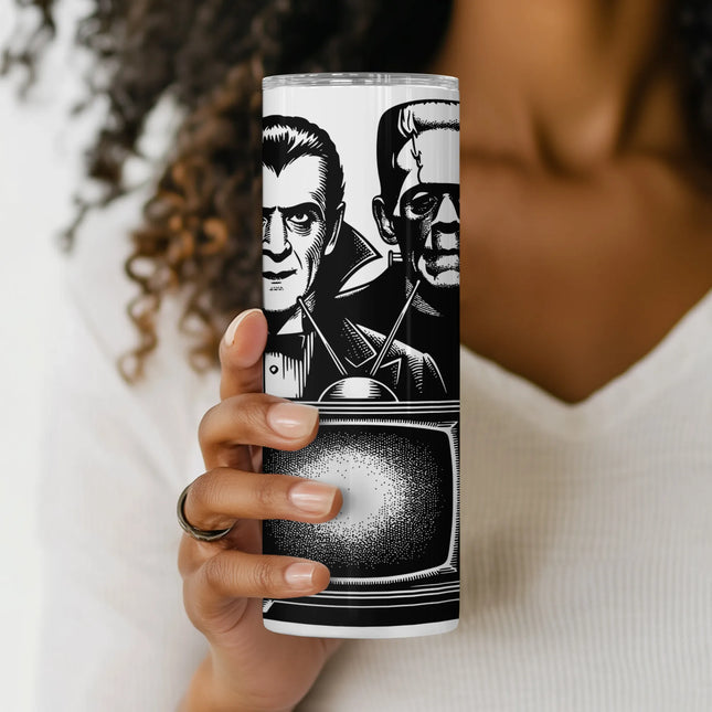 Horror tumbler design with old-school TV and monster duo, ideal for spooky crafting and POD gifts.