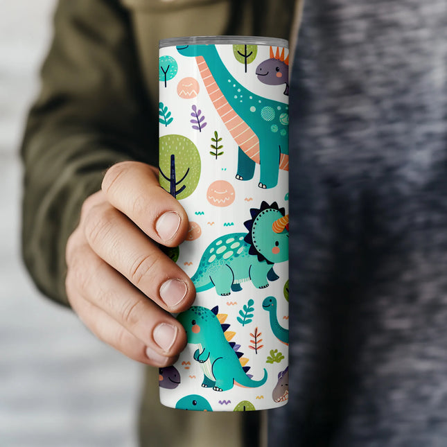 Digital PNG featuring smiling dinosaurs and trees on a playful tumbler wrap, perfect for DIY kids’ gifts.